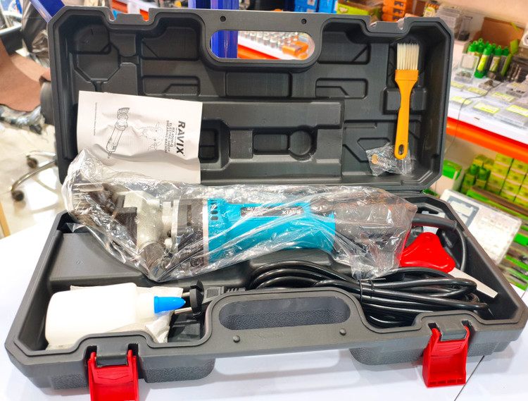 پشمچین برقی گوسفند RAVIX مدل RX-450W-Q قدرت ۶۵۰ وات (فول پک + تیغه یدک)