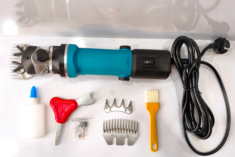 پشمچین برقی گوسفند RAVIX مدل RX-450W-Q قدرت ۶۵۰ وات (فول پک + تیغه یدک)